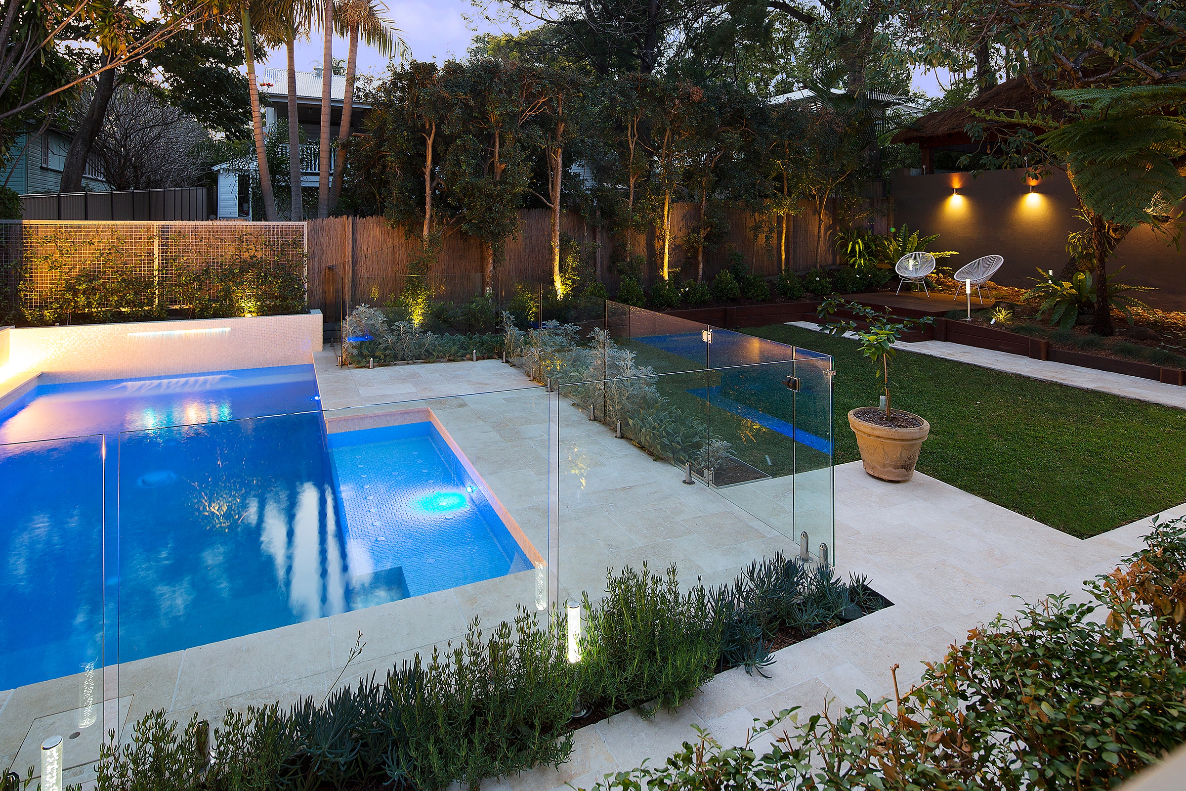 Formal pool and landscape design for a Hendra home